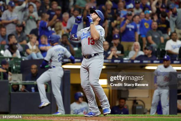 Max Muncy of the Los Angeles Dodgers celebrates a home run during the seventh inning against the Milwaukee Brewers at American Family Field on August...