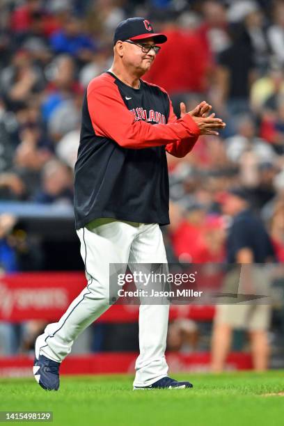 Manager Terry Francona of the Cleveland Guardians walks out for a pitching change during the eighth inning against the Detroit Tigers at Progressive...