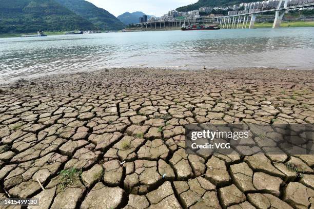 General view of the cracked riverbed due to drought at the Three Gorges Reservoir on August 16, 2022 in Chongqing, China.