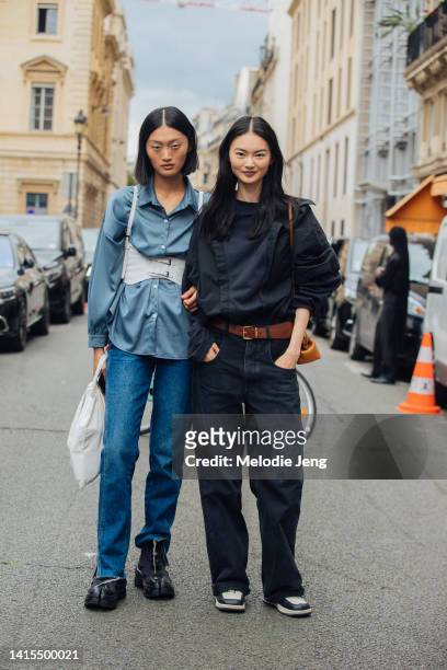 Chinese models Yilan Hua and He Cong at the Fendi show at Palais Brongniart during Couture Fashion Week Fall/Winter 2022 on July 07, 2022 in Paris,...