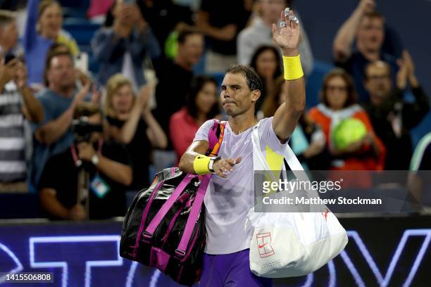 Rafael Nadal of Spain acknowledges the crowd as he leaves the court after losing to Borna Coric of Croatia during the Western & Southern Open at...
