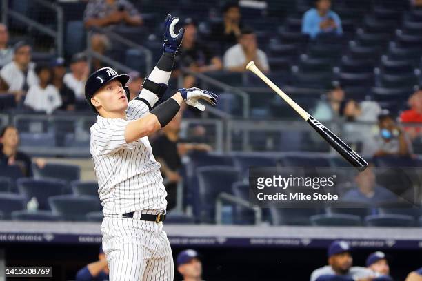 Josh Donaldson of the New York Yankees celebrates after hitting a walk-off grand slam home run in the tenth inning against the Tampa Bay Rays at...