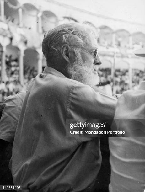 American writer Ernest Hemingway watching a bullfight. Spain, circa 1955.