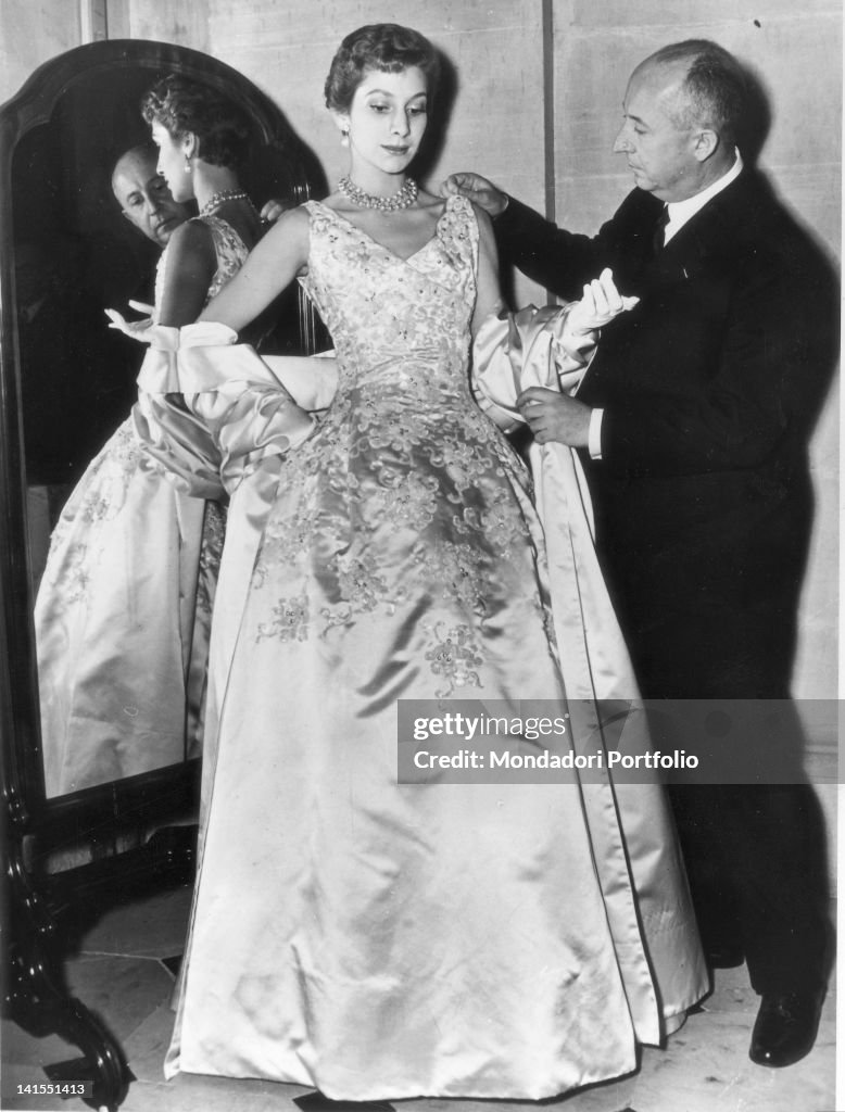 Christian Dior Arranging One Of His Dresses