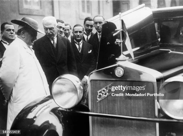 The Italian industrialist and founder of the 'Fiat' car manufacturer meeting Pope Pius IX on the presentation of the new 'Fiat 525' car. Vatican...