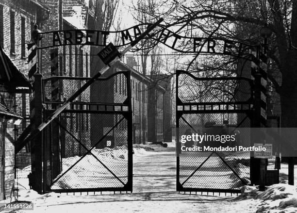 The entrance gate to Auschwitz concentration camp. Auschwitz , 1940s