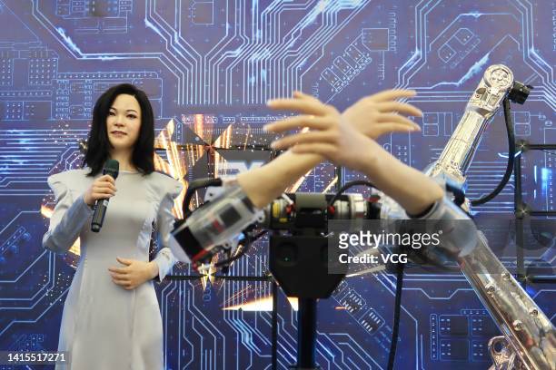 Humanoid robot featuring singer Teresa Teng Li-Chun sings a song during 2022 World Robot Conference at Beijing Etrong International Exhibition &...