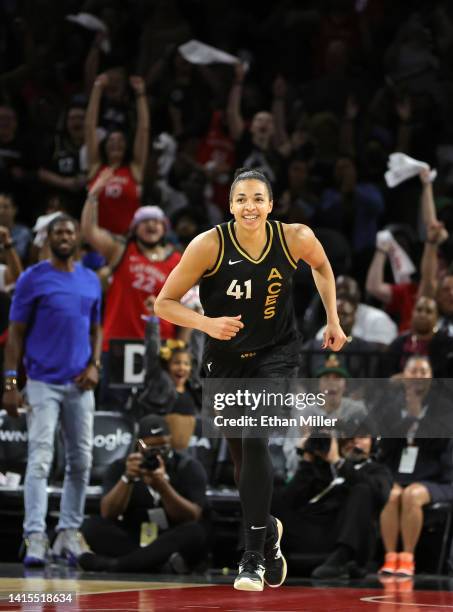 Kiah Stokes of the Las Vegas Aces smiles after scoring on a layup against the Phoenix Mercury in the fourth quarter of Game One of the 2022 WNBA...