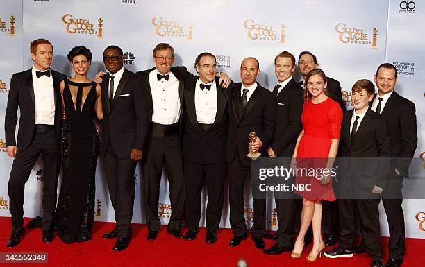 69th ANNUAL GOLDEN GLOBE AWARDS -- Pictured: Cast and producers of "Homeland" winner of best television series ‚Äì drama : Damian Lewis, Morena...