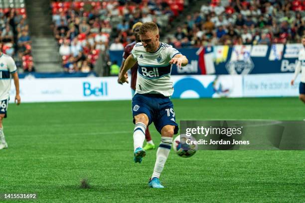 Julian Gressel of the Vancouver Whitecaps FC kicks the ball in the second half against the Colorado Rapids at BC Place on August 17, 2022 in...