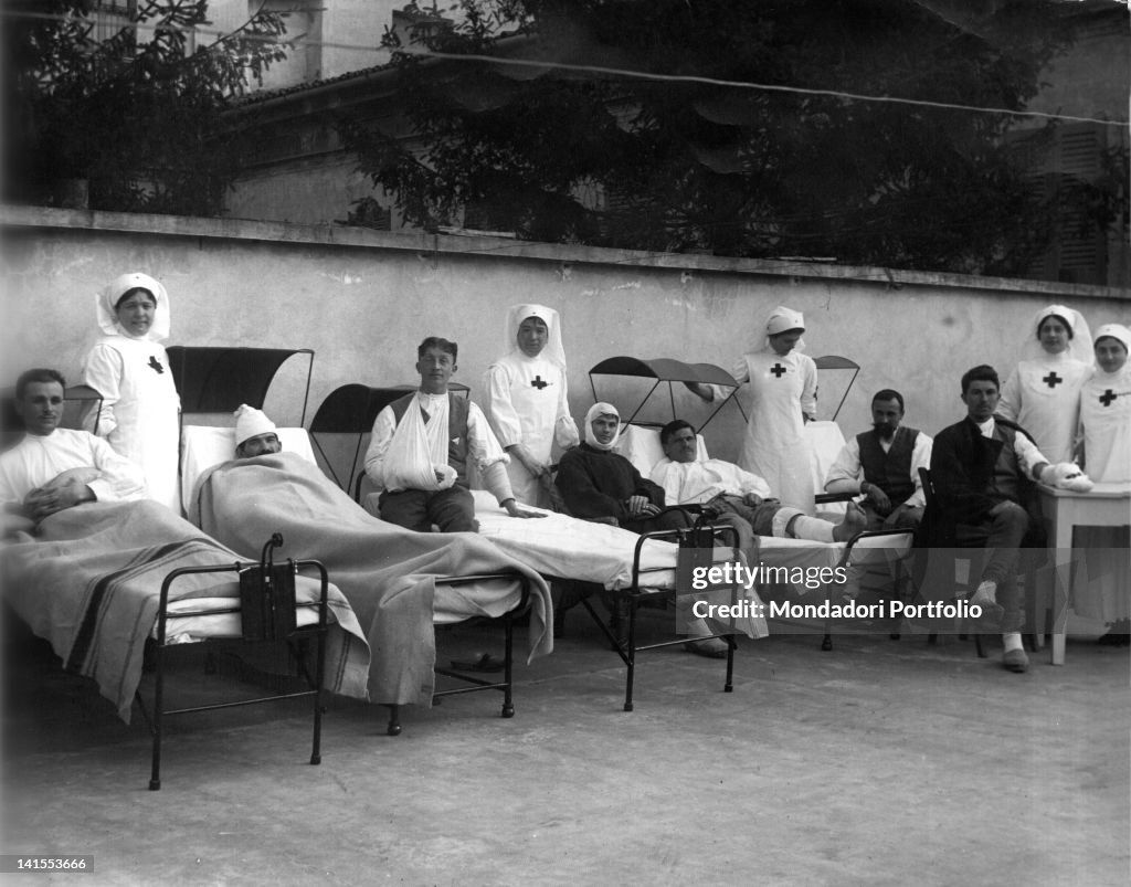 Red Cross Nurses And Wounded Soldiers