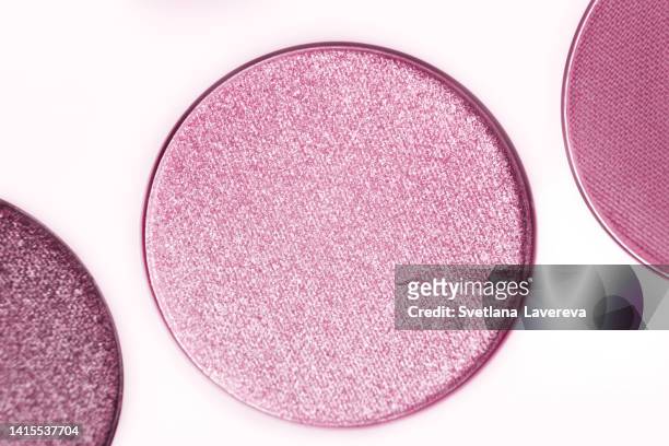 extreme close up pink eye shadows. macrophotography. cosmetic concept. beauty concept. beauty product. - eyeshadow fotografías e imágenes de stock