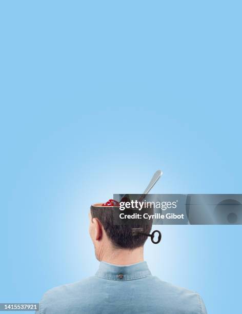 a man's open head is filled with fruit jam - brainfood stock pictures, royalty-free photos & images