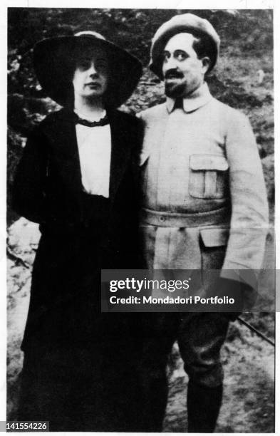 Guillaume Apollinaire, French poet, writer, art critic and dramatist, with his fiancee Madeleine PagFs. Orano, 1916