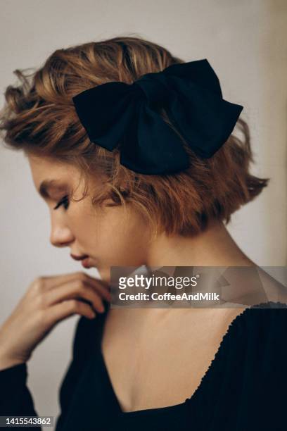 beautiful woman - hair bow stock pictures, royalty-free photos & images
