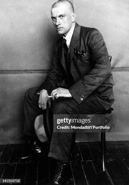 Soviet poet and dramatist Vladimir Mayakovsky smoking a cigarette, 1924.
