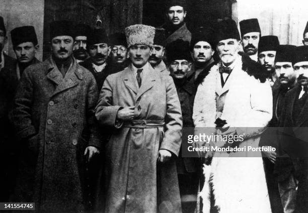 General Mustafa Kemal Ataturk, future President of the Republic of Turkey, posing with some other people attending the Sivas Congress. Sivas,...