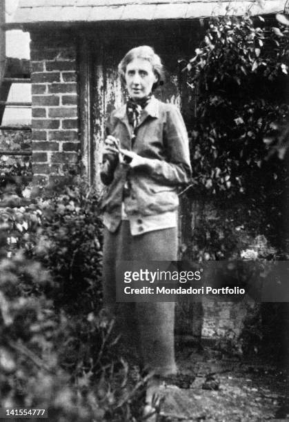 British writer Virginia Woolf in the garden of her house in Rodmell. Rodmell, 1926