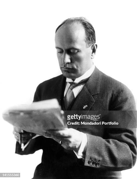 Benito Mussolini reading a newspaper. 1910s
