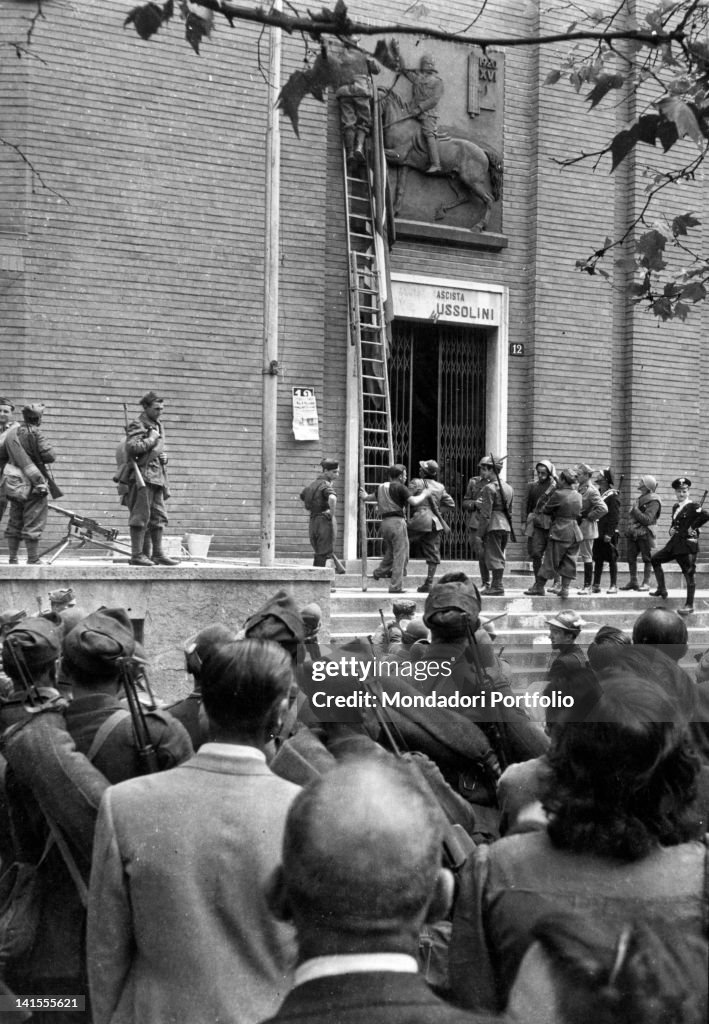 A Statue Of Mussolini Is Covered