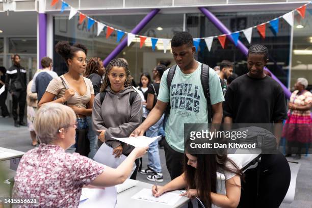 Students at The City of London Academy in Southwark receive their A-Level results on August 18, 2022 in London, United Kingdom. This is the first...