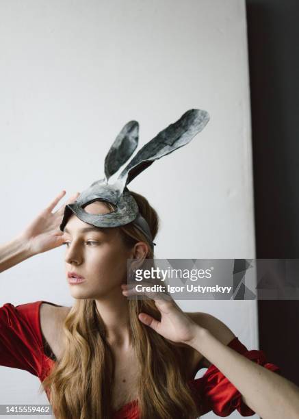 beautiful blond woman with bunny ears - rabbit mask stockfoto's en -beelden