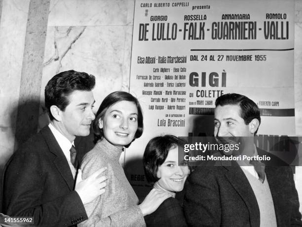 The cast of Colette's comedy 'Gigi' directed by Giorgio De Lullo posing in front of a poster. Italy, 1951