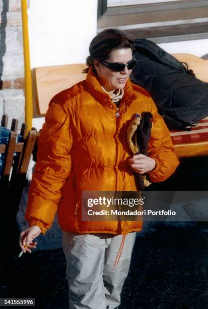 Princess Caroline of Monaco in skiwear smoking a cigarette. 1980s