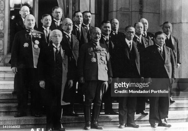 Members of the Hideki Tojo Cabinet Japanese Government on the stairs outside the Government Palace at Tokyo. Tokyo, April 1943