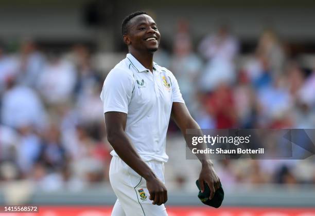 Kagiso Rabada of South Africa celebrates with team match ball after trapping James Anderson of England LBW for his 5th wicket during day two of the...