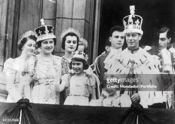 The British Royal Family appearing on the Buckingham Palace balcony and greeting the crowd after the coronation of George VI. London, 12th May 1937