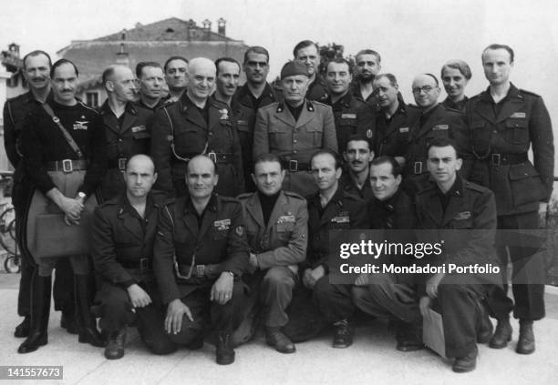 Head of Italian Government Benito Mussolini and secretary of the National Fascist Party Alessandro Pavolini posing with a Black Brigade. Italy,...