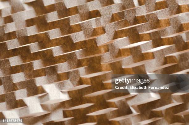 honeycomb cells of cardboard background - upcycled material stock pictures, royalty-free photos & images