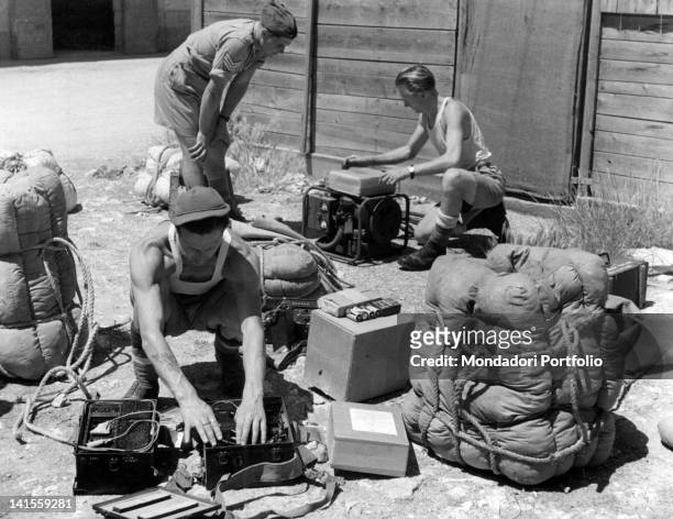 British soldiers packing supplies that will be launched to partisans placed in Northern Italy. Italy, August 1944