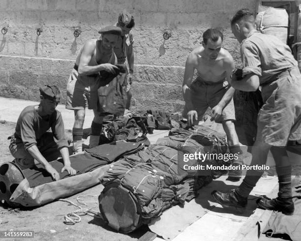 British soldiers packing supplies that will be launched to partisans placed in Northern Italy. Italy, August 1944