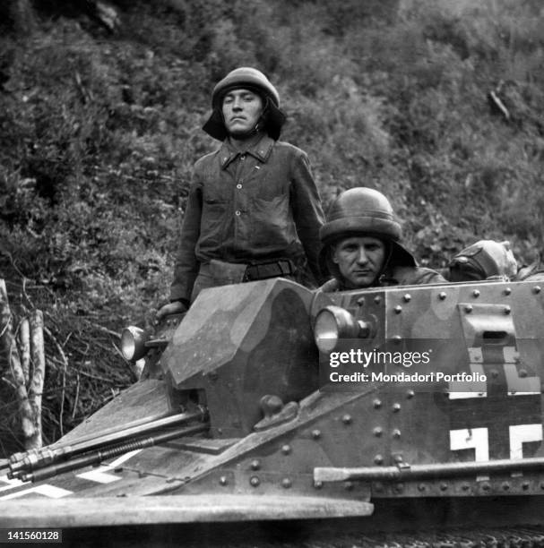 Hungarian tank crew emerges from the turret during a mopping up operation against bands of partisans in the Cherkasy area. Ukraine, September 1941