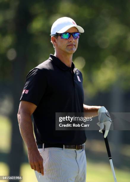 Adam Scott of Australia prepares to tee off on the third tee during the first round of the BMW Championship at Wilmington Country Club on August 18,...