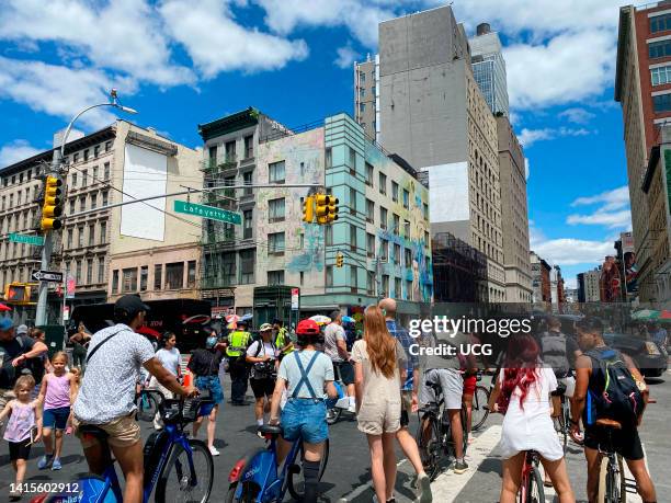 Summer Streets event with large numbers of cyclists, runners and people, Manhattan, New York City.