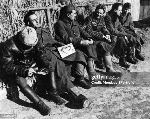 In an airbase in the Seversky Donets basin, on the Southern Russian front, a few Hungarian soldiers relaxing by enjoying the sun. March 1942