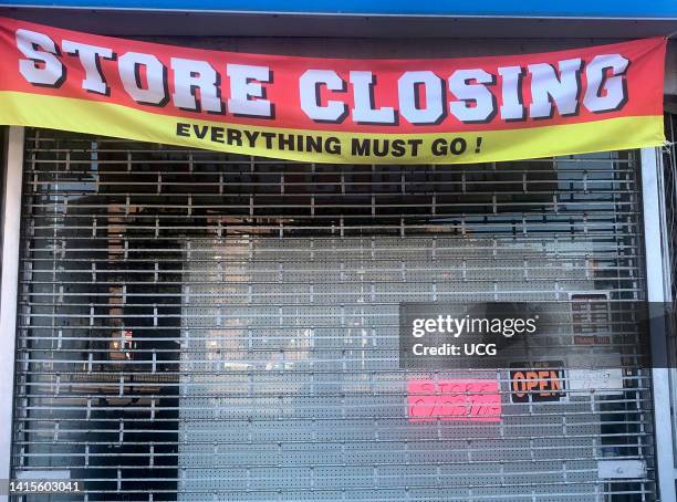 Store Closing, Everything Must Go banner on local Hardware store, Queens, New York.