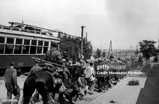 Soviet prisoners captured during the Rostov battle are escorted to the collecting camp. Rostov, July 1942