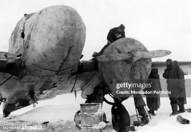 An Italian bomber being overhauled in a base in the Seversky Donets Basin. April, 1942
