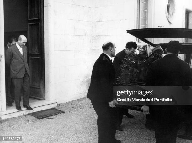 Italian singer Luigi Tenco's body on the hearse. Sanremo, January 1967