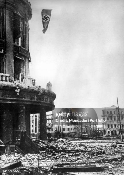 Nazi flag waving on the ruins of a building of the centre. Stalingrad, October 1942