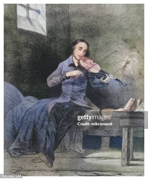 old engraved illustration of niccolò (or nicolò) paganini (italian violinist and composer) playing the violin in a prison cell - paganini stock-fotos und bilder