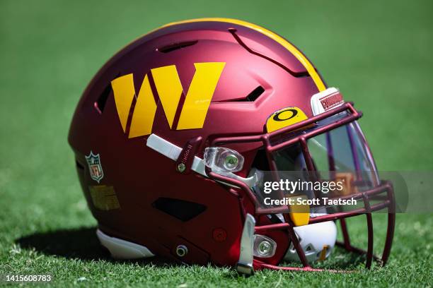 Washington Commanders helmet is seen on the field before the preseason game between the Washington Commanders and the Carolina Panthers at FedExField...