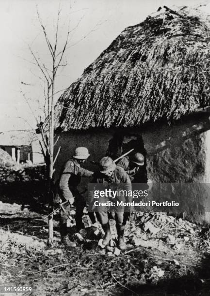 German rear guard patrol moving away from a village on the Russian front. Krymsk, May 1943