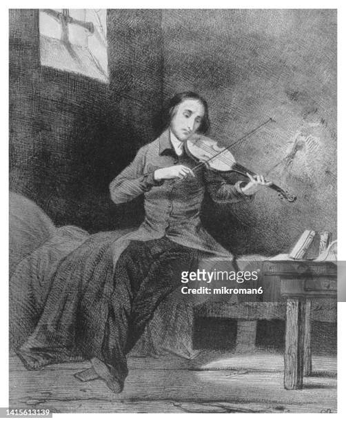 old engraved illustration of niccolò (or nicolò) paganini (italian violinist and composer) playing the violin in a prison cell - paganini - fotografias e filmes do acervo