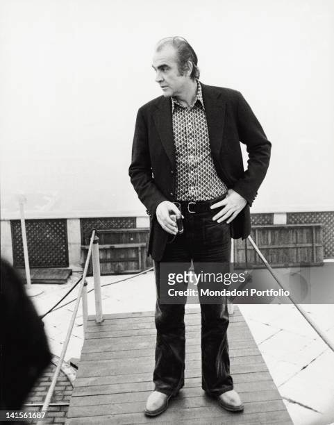 The Scottish actor Sean Connery, the famous fictional James Bond agent, is photographed outside his hotel in Milan on the occasion of an interview....