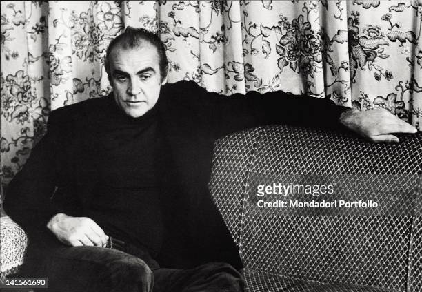 The Scottish actor Sean Connery, the famous fictional James Bond agent, is sat on an armchair on the occasion of an interview in Italy. Milan, 1973.